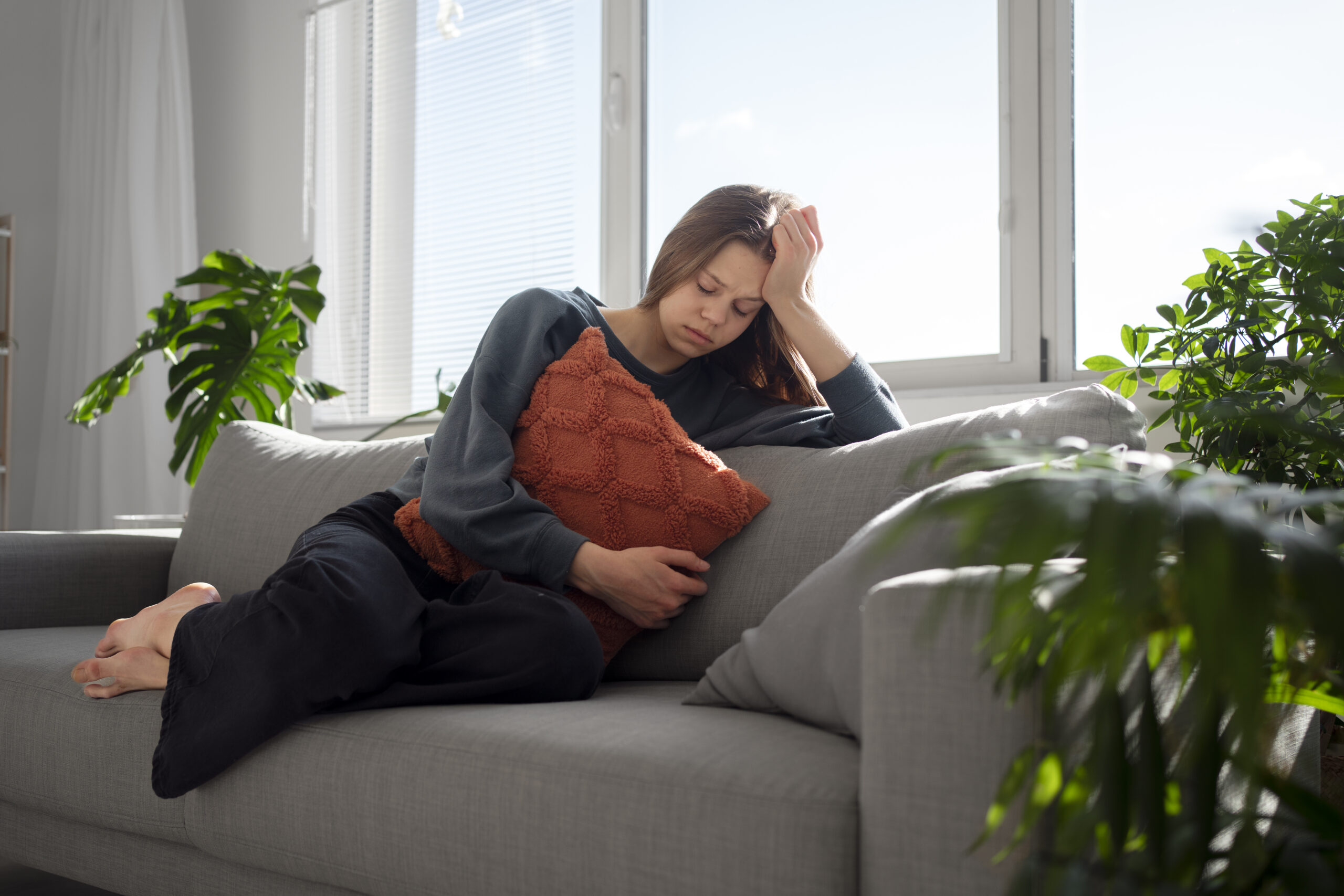 Success Stories 2 sad young woman home scaled
